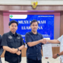 Hadi Surya Pratama menerima jabatan ketua PB HIPPMIH di Aula KPU Riau