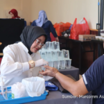 Aston Tanjungpinang Hotel staff and public receiving free health checks and donating blood