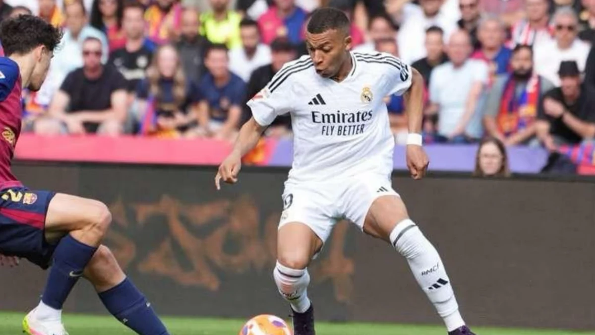 Kylian Mbappe merayakan gol kemenangan Real Madrid melawan Barcelona di Camp Nou