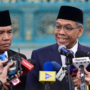 Kepala BPGMN Satyawan Pudyatmoko berdiri di Istana Negara Jakarta