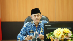 Supriyadi kepala Diskominfotik Riau berbicara tentang data statistik di acara BPS